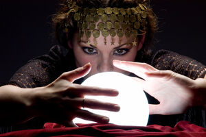 Person with glowing crystal ball