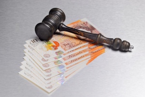 Gavel with GBP currency